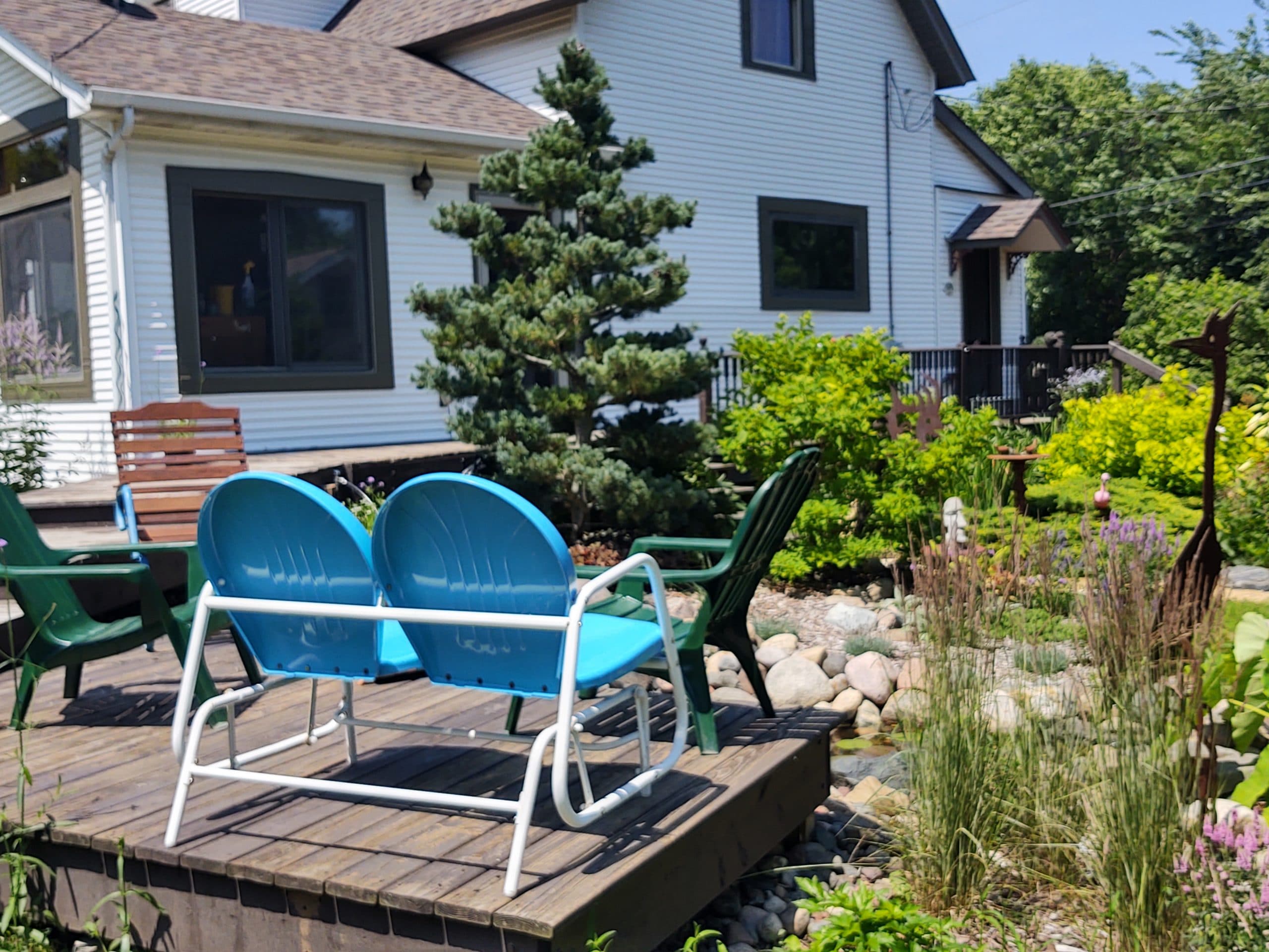 outdoor deck wrapping around a garden area
